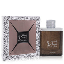 oud najdia by lattafa eau de parfum spray (unisex) 3.4 oz